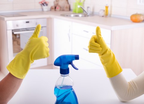 Cleaning staff following safe working practices during routine duties